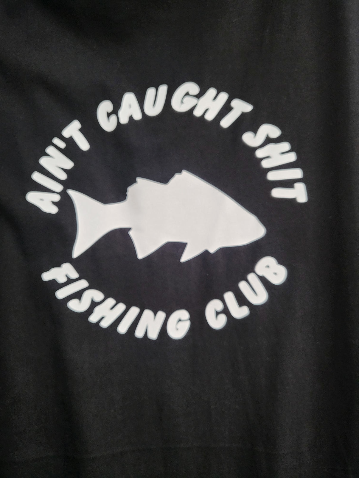 AINT CAUGHT SHIT Tee